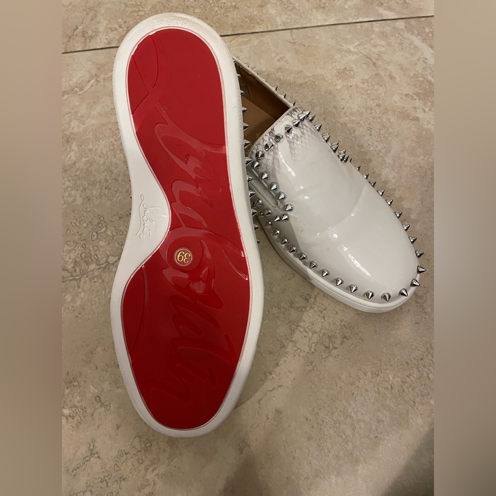 spiky red sole sneaker